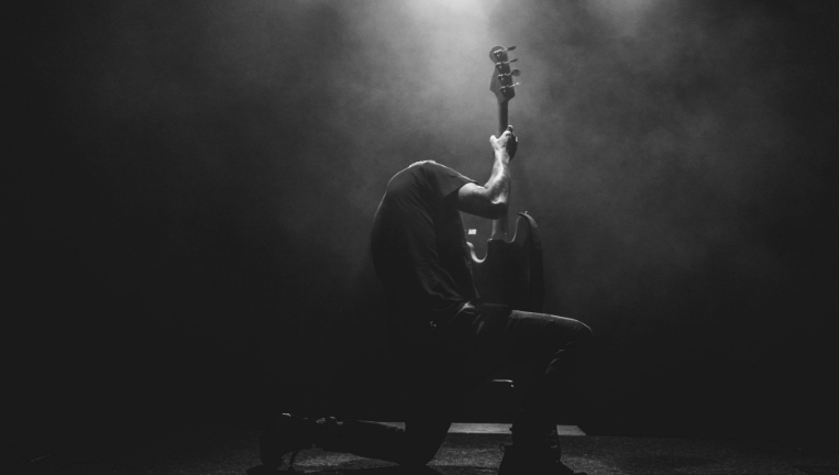 Guitarist playing his guitar